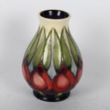 Moorcroft tube-lined vase with stylised floral decoration, 12cm x 5cm