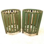 A pair of green painted cast-iron and wooden slatted litter bins, D54cm, H71cm