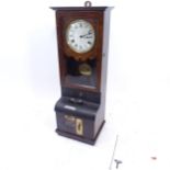 An early 20th century mahogany-cased clocking in/out machine, with key and pendulum, W37cm, H95cm,