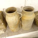 A pair of French galvanised metal milk churns, W38cm, H50cm (1 handle missing)