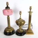 2 Antique oil lamps converted to electric, tallest 50cm, and a brass Corinthian column table lamp