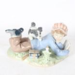 Lladro boy and puppy group, 5451, length 16cm