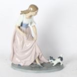 NAO sculpture of a girl with a puppy(A/F), height 30cm