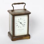 A brass-cased carriage clock, by Matthew Norman of London, white enamel dial with Roman numeral hour