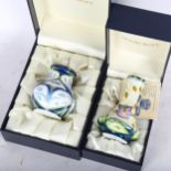 2 boxed Moorcroft enamel vases with floral designs, tallest 8cm