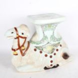 A camel design glazed ceramic garden seat, height 39cm