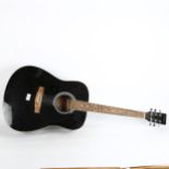 A black C Giant 41' Western acoustic guitar
