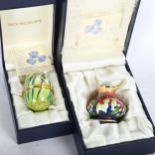 A boxed Moorcroft miniature enamel vase, 4.5cm, and a boxed Moorcroft egg design box