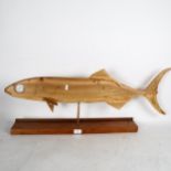 Clive Fredriksson, a carved wood fish with glass eye, length 84cm, on stand