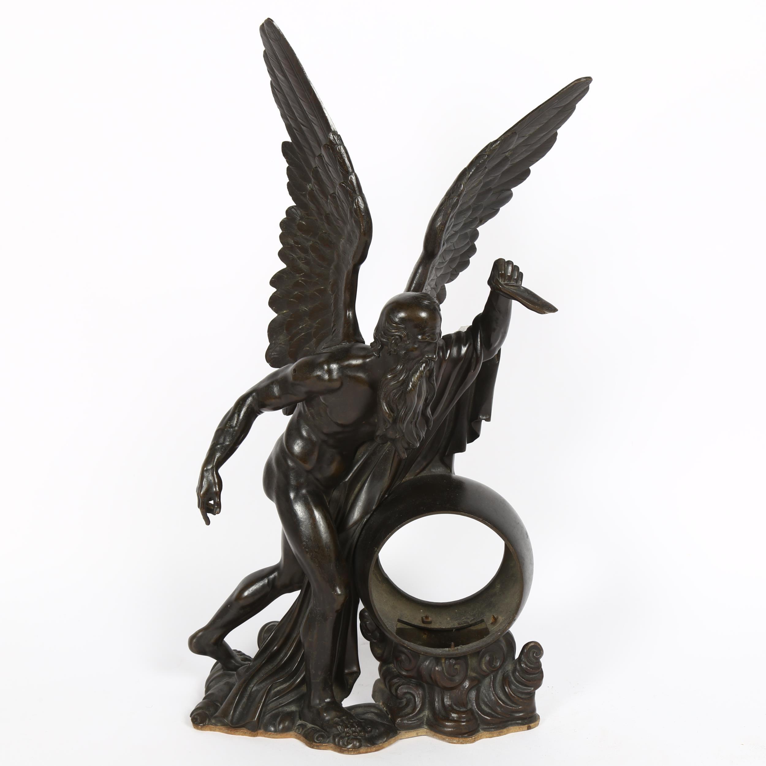 A large 19th century patinated bronze figural sculpture clock case, winged Chronos (God of time), on