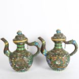 A pair of Chinese enamel teapots, height 29cm