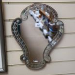 A Venetian style wall mirror, with ornate shaped frame, height 43cm