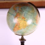 A Vintage globe on stand, globe diameter 28cm, height including stand 94cm