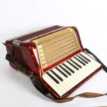 A Worldmaster Foreign accordion, cased