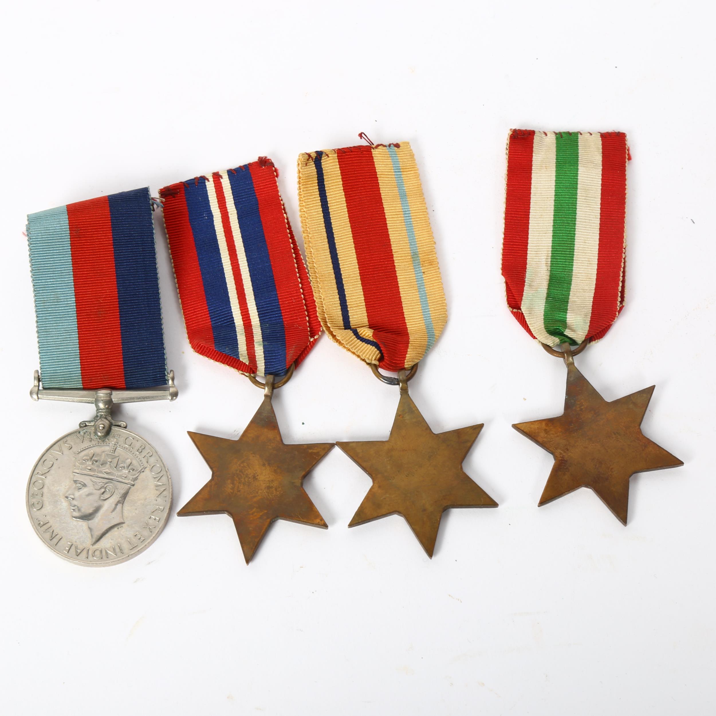 A set of 4 Second World War Service medals, comprising George VI War medal, African Star, 1939 -1945 - Image 2 of 2