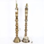 A pair of Indian brass candlesticks converted into lamps, height 89cm