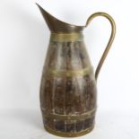 A French oak coopered jug, height 60cm