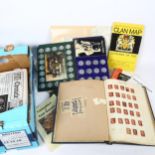 Various postage stamps and collectable tokens, including blue stamp album containing 2 pages of
