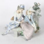 NAO porcelain sculptural group depicting young man with a mandolin and girl on a bench, height 24cm