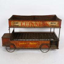 A mid-20th century Guinness Omnibus advertising bottle crate, modelled as a London bus, L46cm,