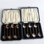 A cased set of 6 silver bean-end coffee spoons, Birmingham 1931, and a similar silver plated set