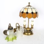 A pair of Art Deco style wall light fittings, and a table lamp with leadlight shade