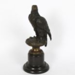 After Archibald Thorburn, a French patinated bronze sculpture, eagle on naturalistic base with Paris