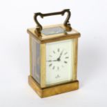 An Imperial brass-cased carriage clock, with Fema 11 jewel movement and Roman numeral hour