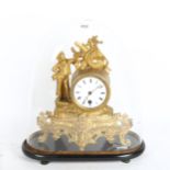 A French gilt figural 8-day clock with glass dome, height including dome 35cm