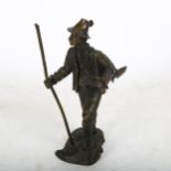 Bronze sculpture of a European huntsman with rifle and staff, height 15cm