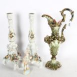 A pair of Vienna porcelain candlesticks, with flower encrusted decoration, height 33cm, and an