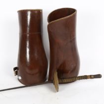 A Vintage fencing foil, and a pair of leather gaiters, height 31cm (2)