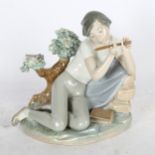 Lladro boy playing flute (A/F), height 20cm