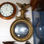 A 19th century gilt-gesso circular convex wall mirror, with eagle pediment, overall height 85cm