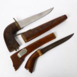 2 Indian daggers, with hardwood sheaths, largest length 30cm (2)