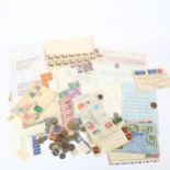 Various postage stamps and world coins