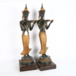 A pair of ceremonial Thai figures, made from spelter, and carrying serving trays, height including