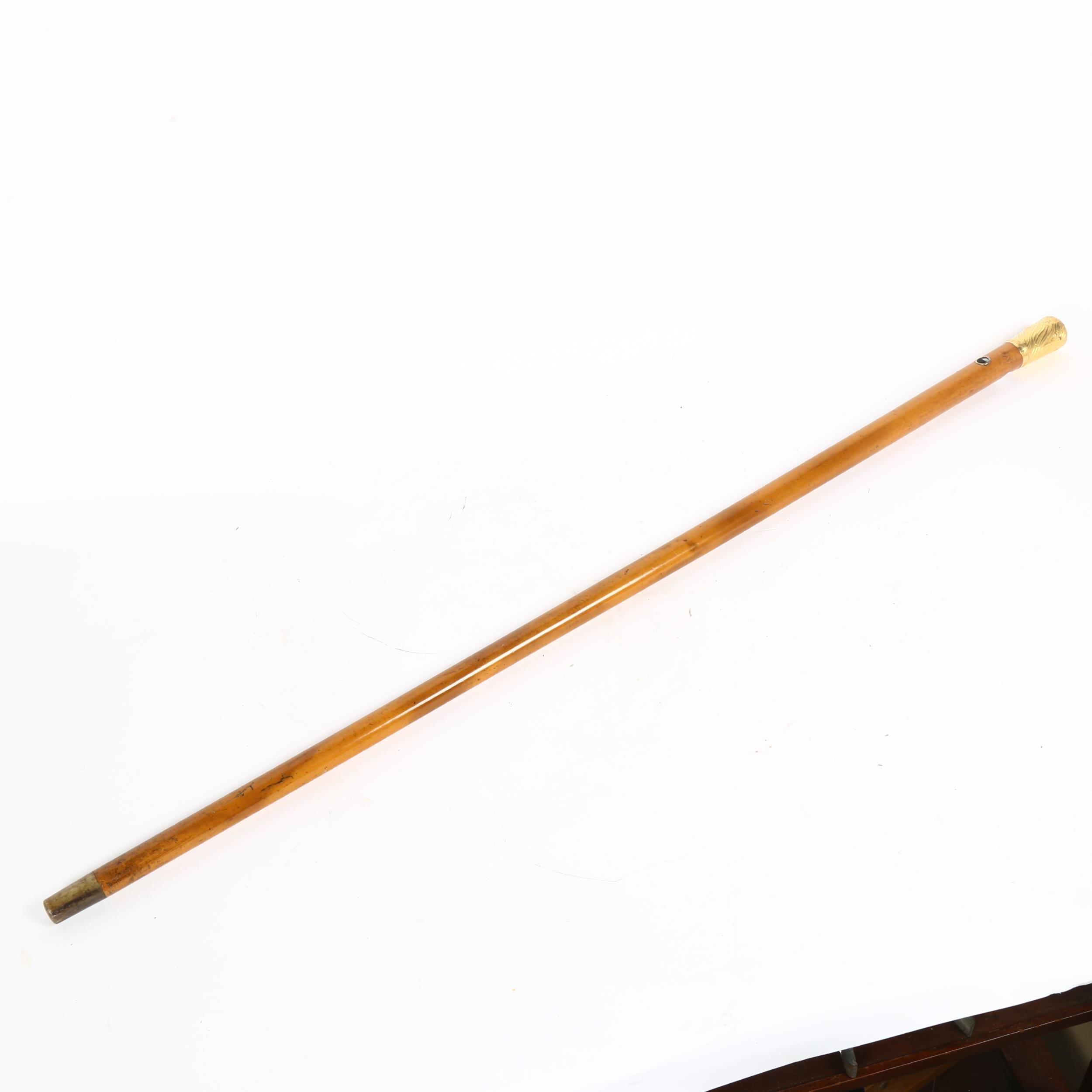 A 19th century Malacca walking cane, with unmarked yellow metal knop, engraved with rampant lion - Image 2 of 2