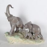 Lladro family group of 3 elephants on naturalistic plinth, height 37cm