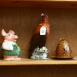 A Beswick Golden eagle decanter, Wade pig, and a honeypot