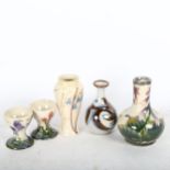 A Cobridge vase, height 10.5cm, boxed, pair of egg cups, vase with Harebell decoration, and another
