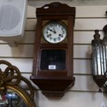 A Vintage stained oak 8-day drop-dial wall clock, case height 55cm, with pendulum