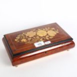 An Italian Sorrento Ware jewellery box, with Swiss musical movement, width 27cm