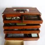 A Vintage tool chest or engineer's cabinet, drawers are full of small tools and various instruments,