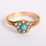An unmarked yellow metal seed pearl and turquoise set ring