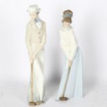 Pair of NAO figures playing croquet, tallest 35cm