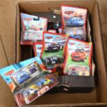 A quantity of boxed and loose Disney Pixar Cars The Movie diecast vehicles, including Sally With