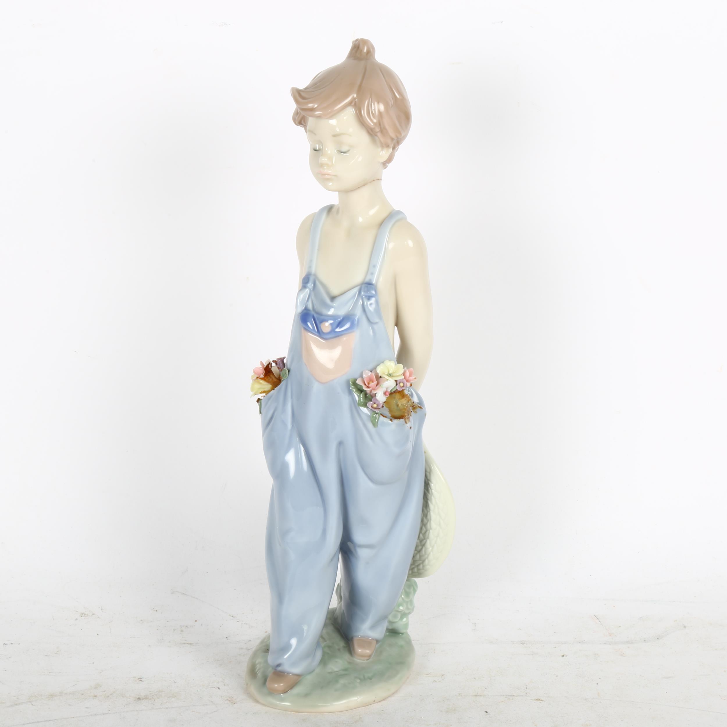 Lladro child wearing dungarees, 7650, 24cm