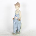 Lladro child wearing dungarees, 7650, 24cm