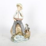 Lladro boy with sailing boat and puppy, A23F, 23.5cm